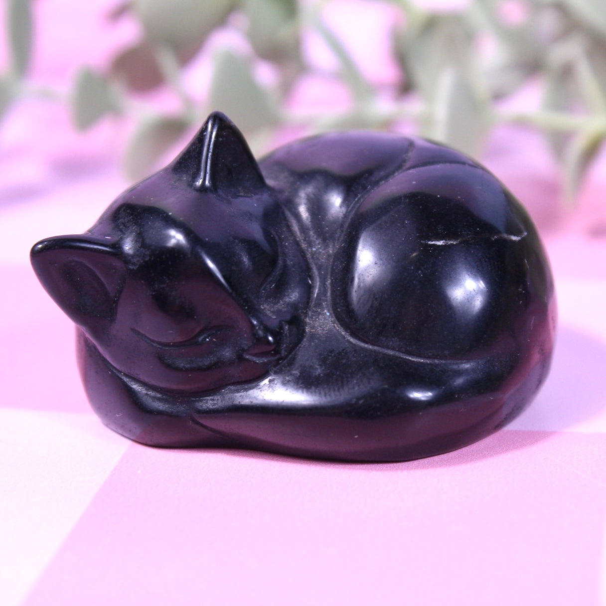 Black obsidian sleeping cat