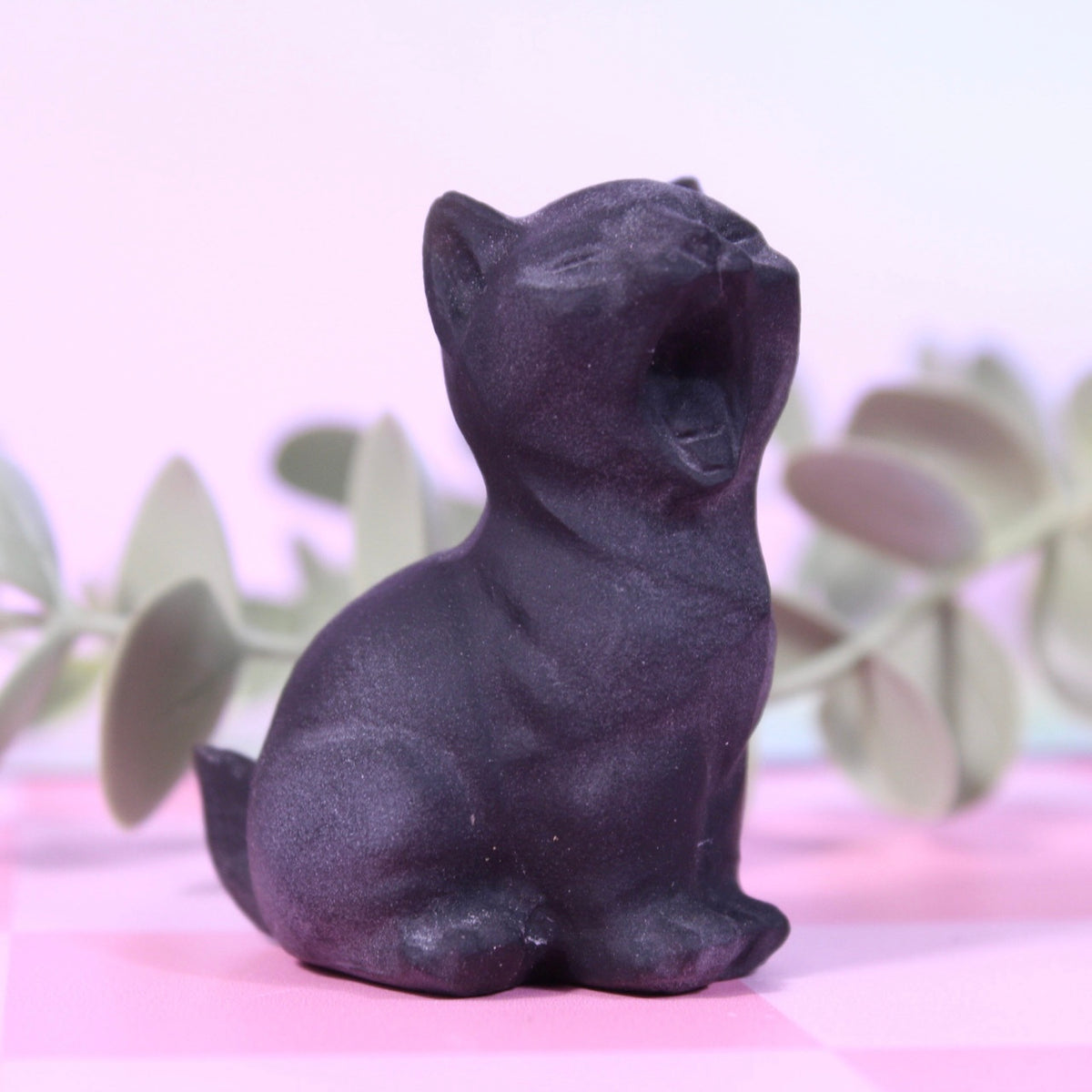 Obsidian yawning cat