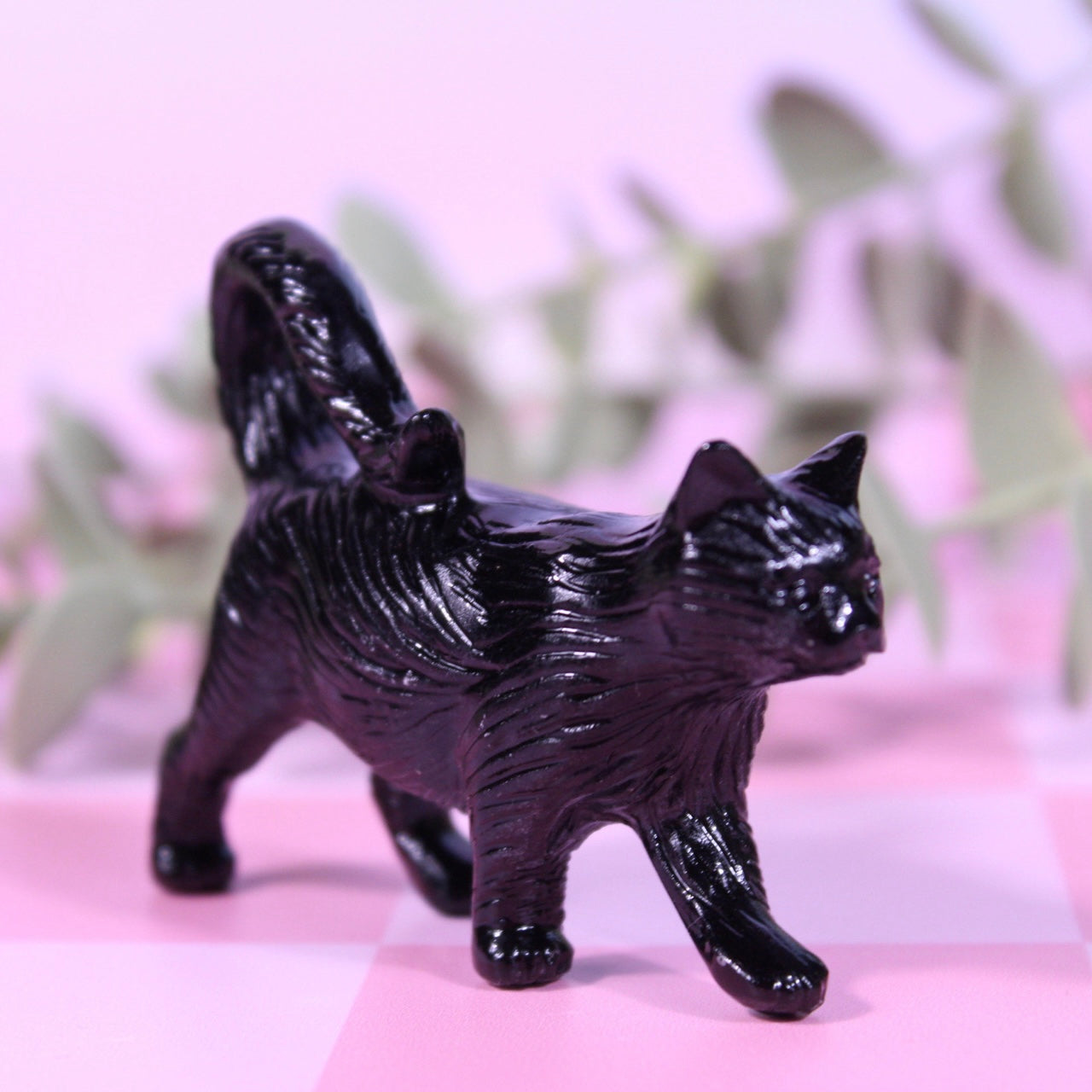 Black obsidian walking cat