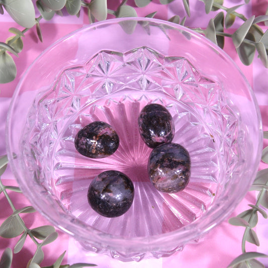 Rhodonite tumbles