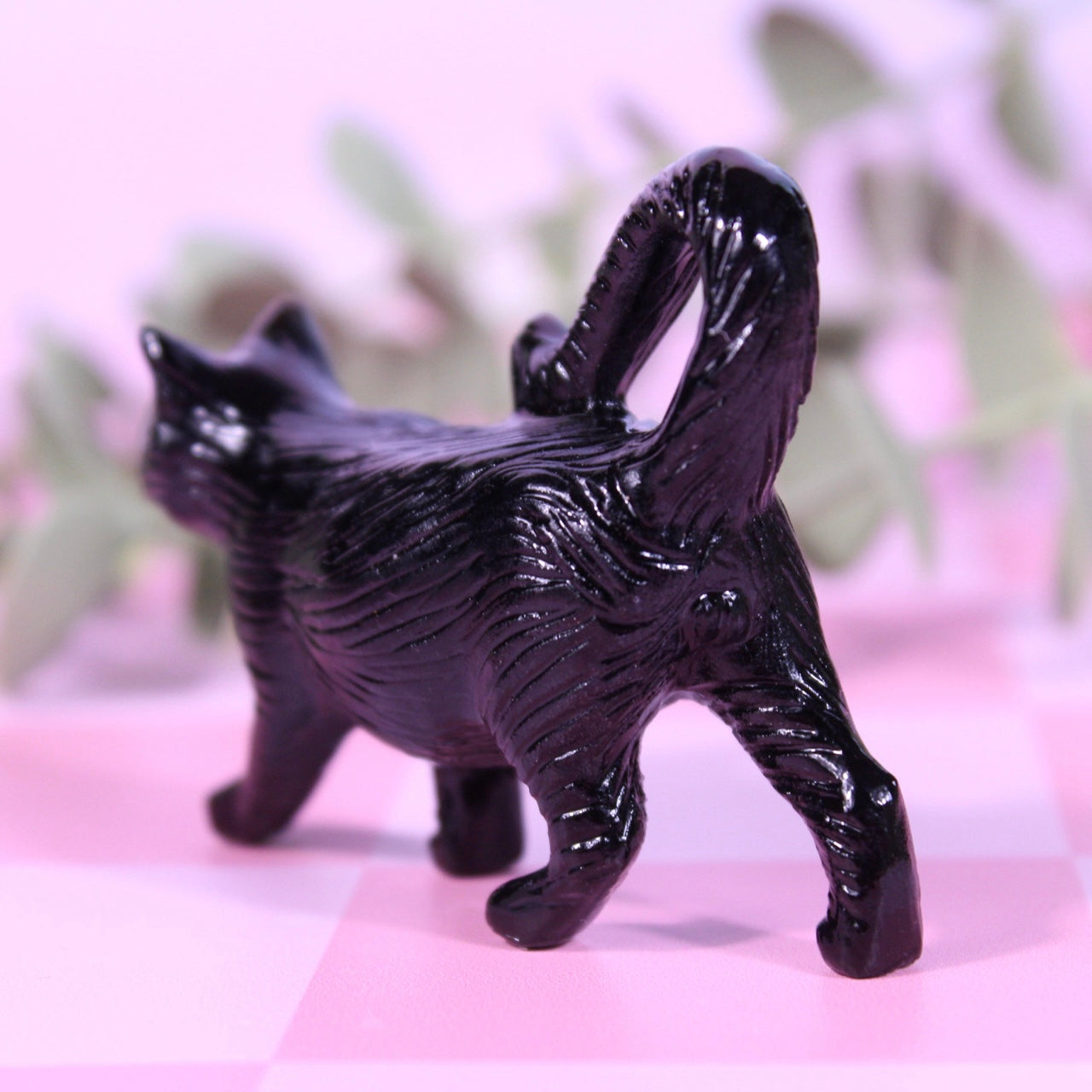 Black obsidian walking cat