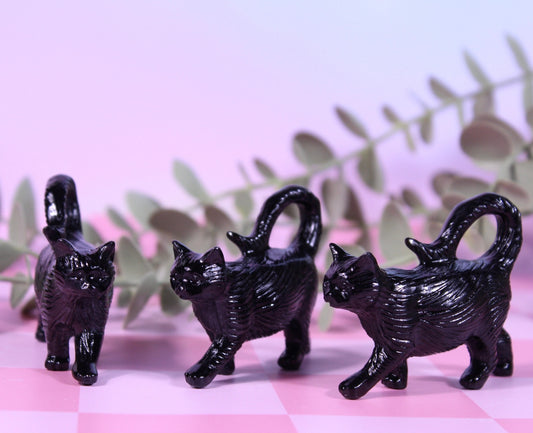 Black obsidian walking cat