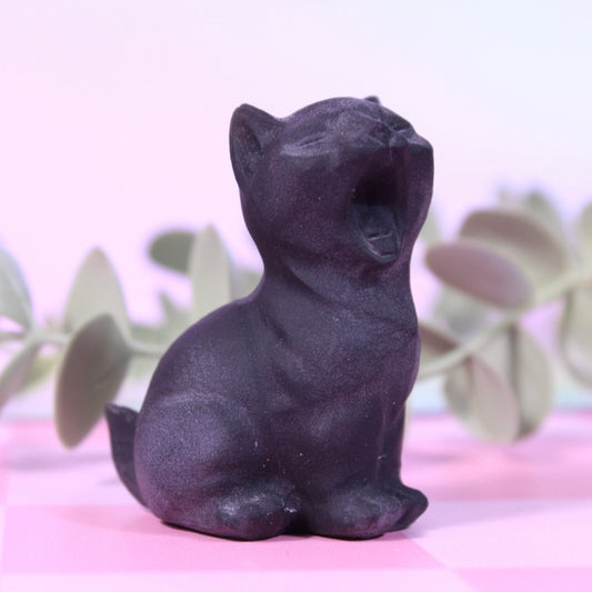 Obsidian yawning cat